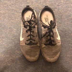 Black and white mesh Nike free 5.0